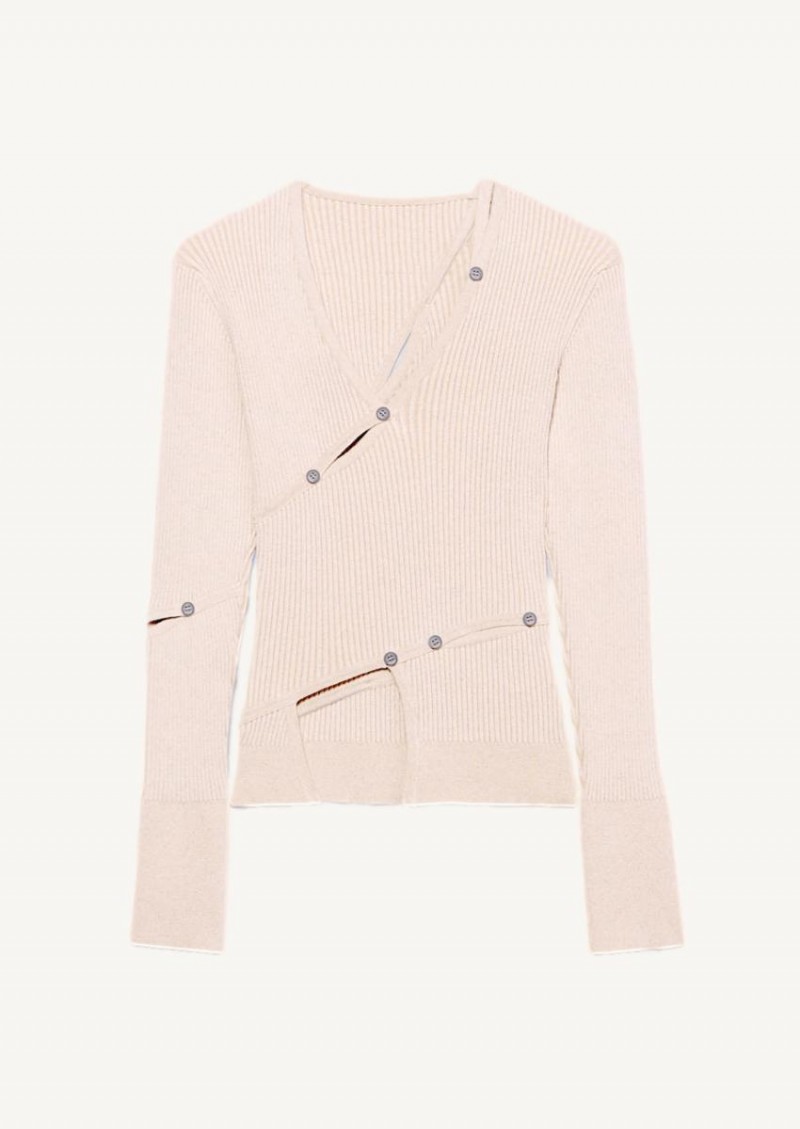 Le cardigan tordu light beige