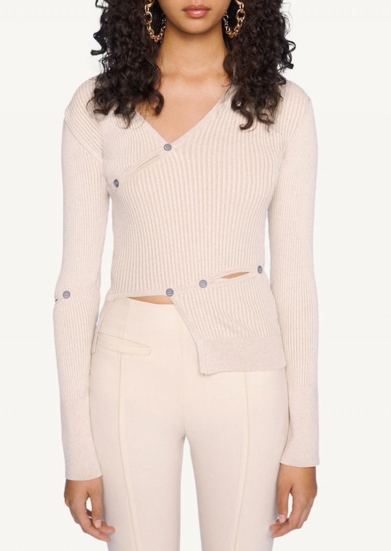 Le cardigan tordu light beige
