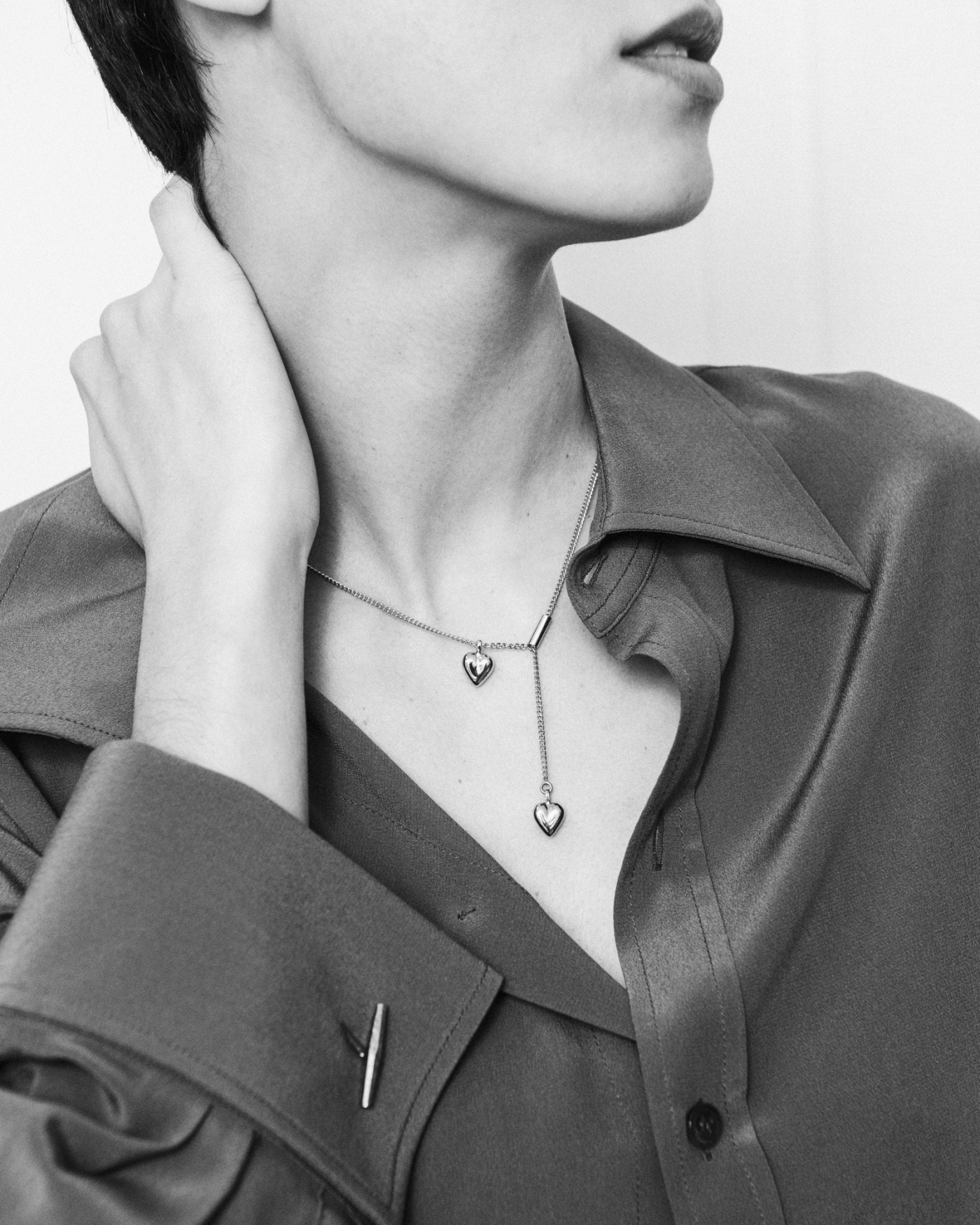 Sliding necklace with golden heart charm