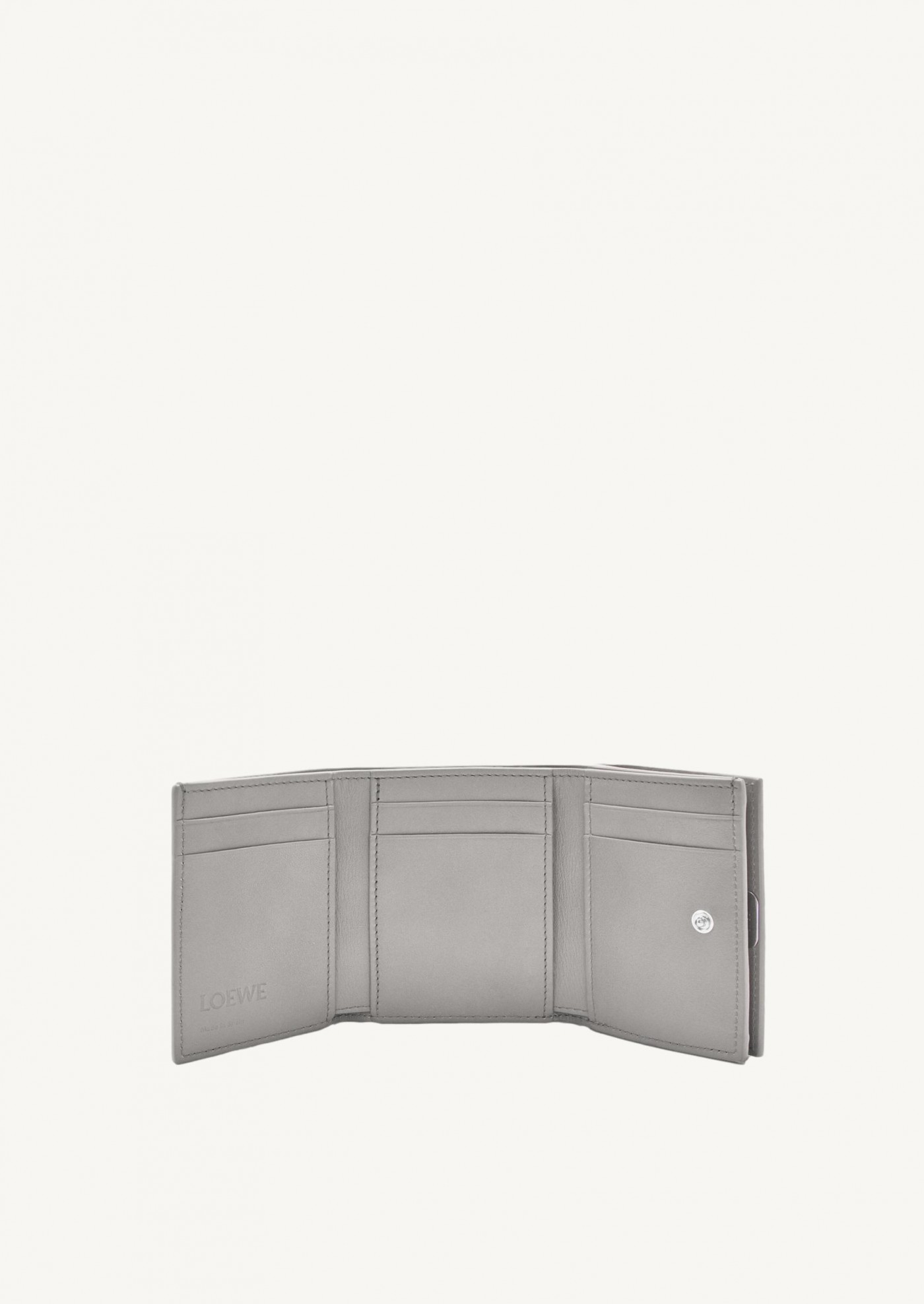 Anagram trifold wallet in pebble grain calfskin grey