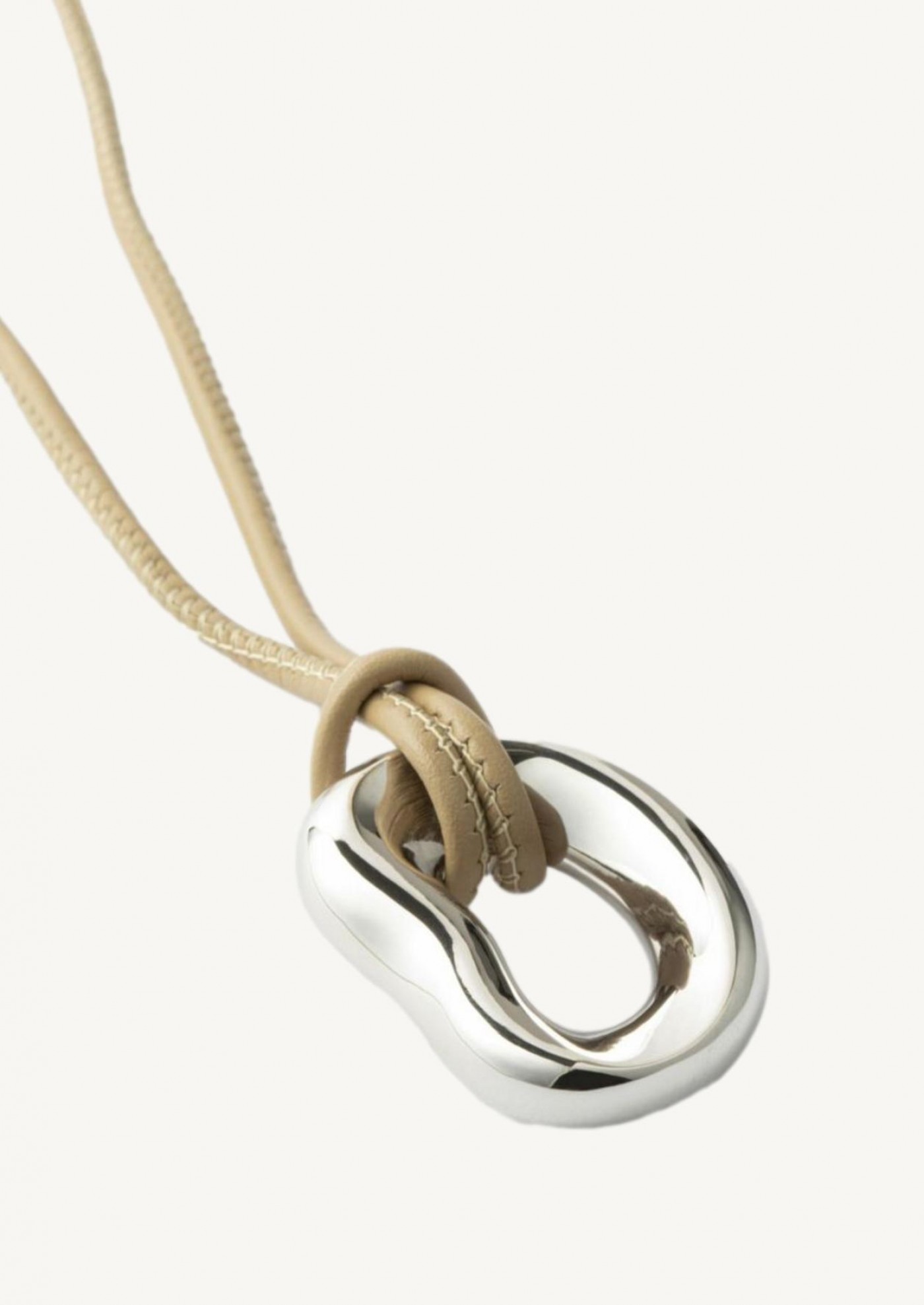 Shima pendant on silver leather