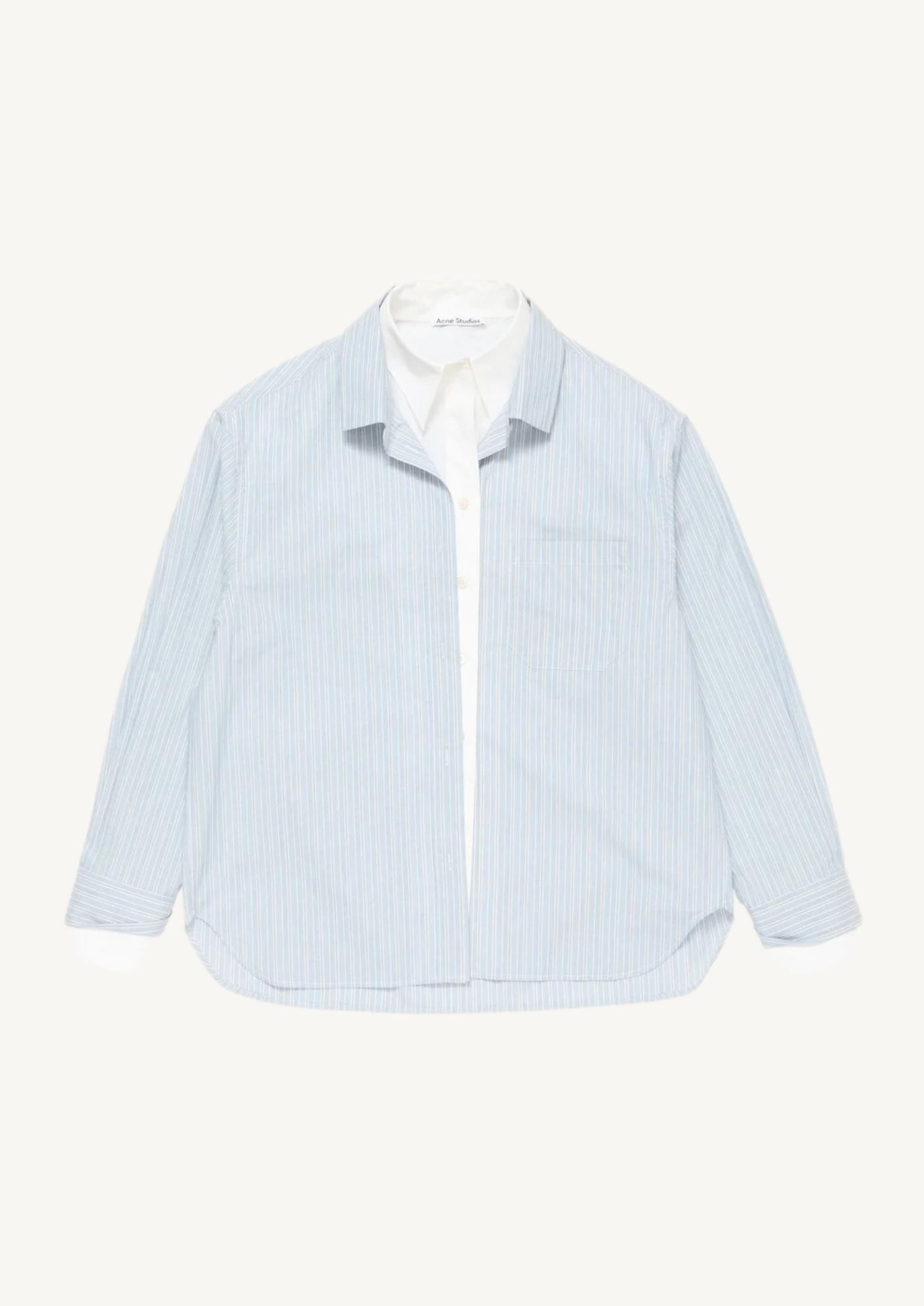 Shirt with overlapping buttons