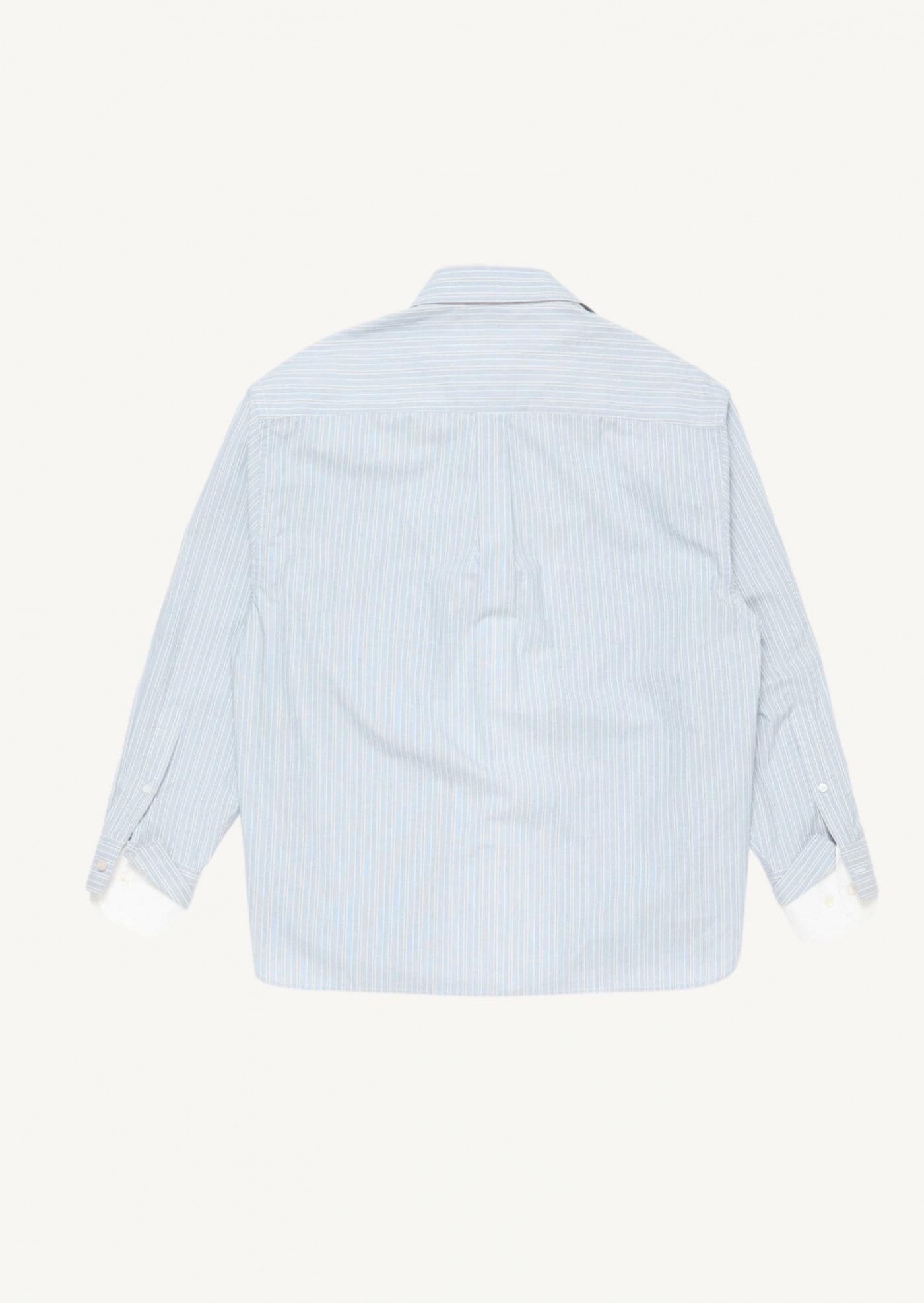 Shirt with overlapping buttons