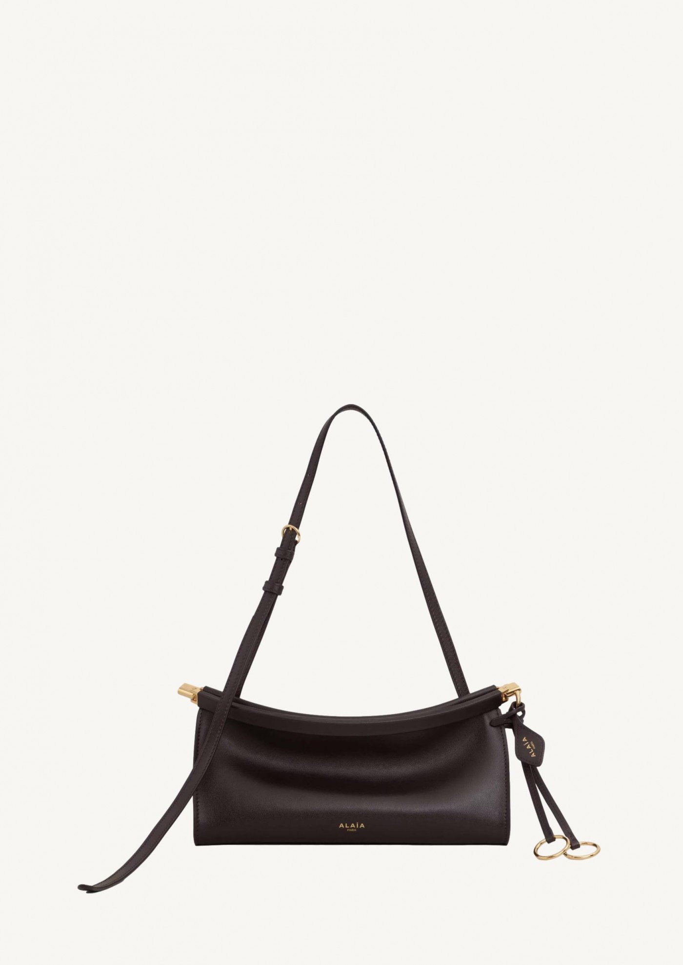 The small dark brown Click East West