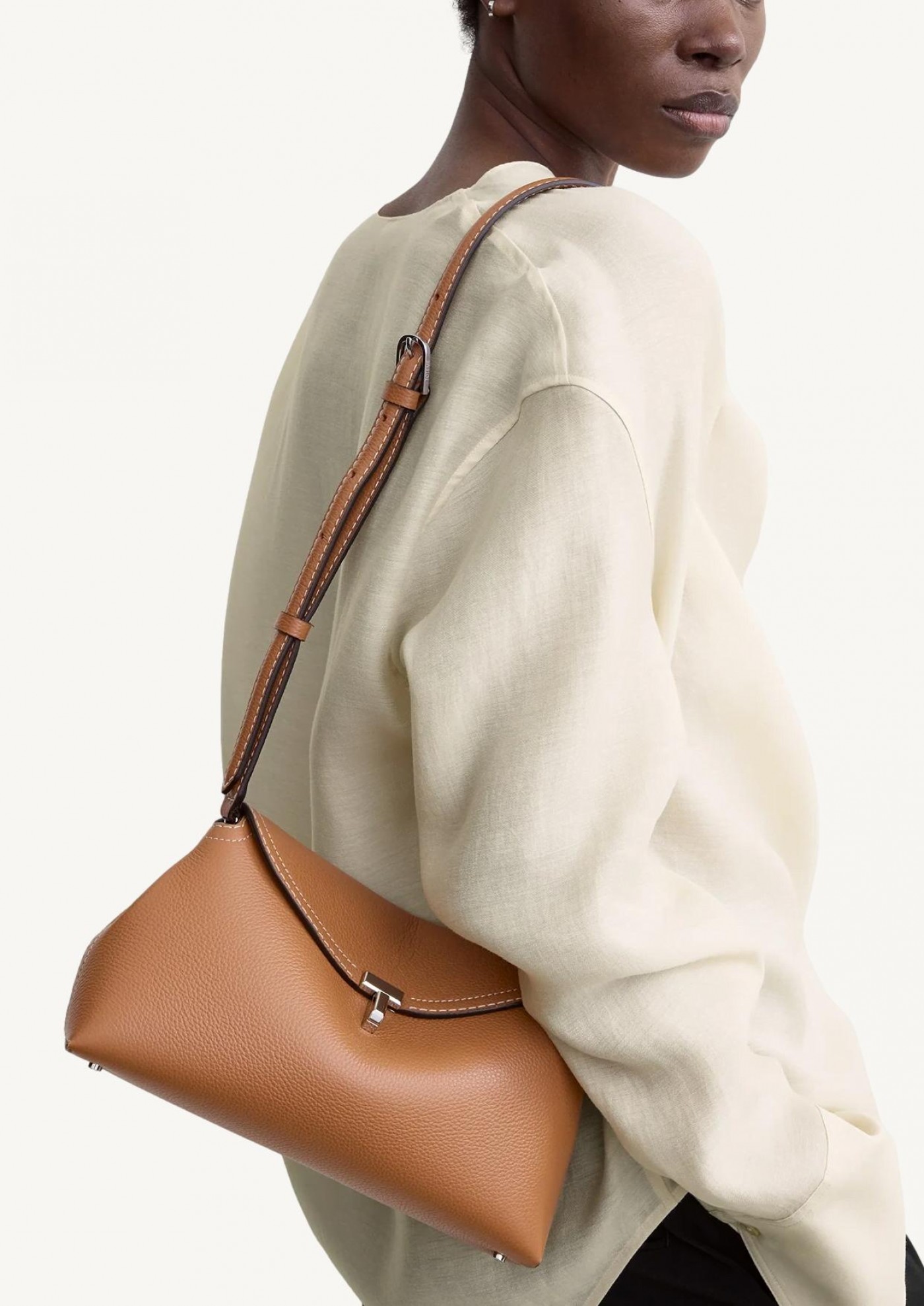 T-lock grained-leather clutch tan Totême