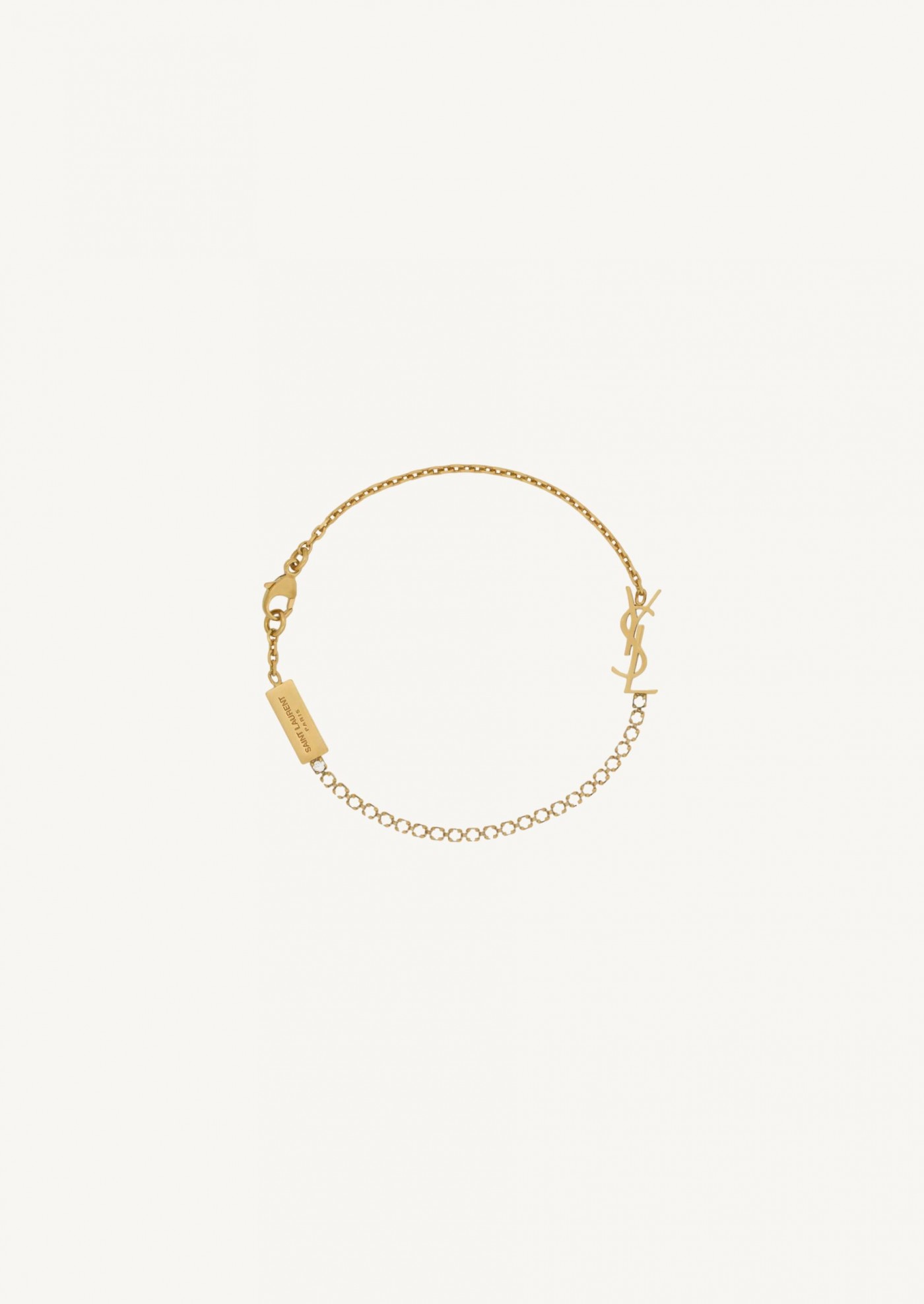 CASSANDRE METAL AND RHINESTONE CHARM BRACELET
